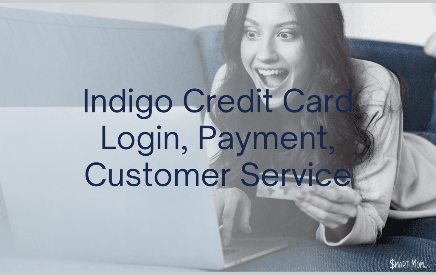 indigo credit card login payment customer service lady shopping on laptop computer laughing and holding credit card