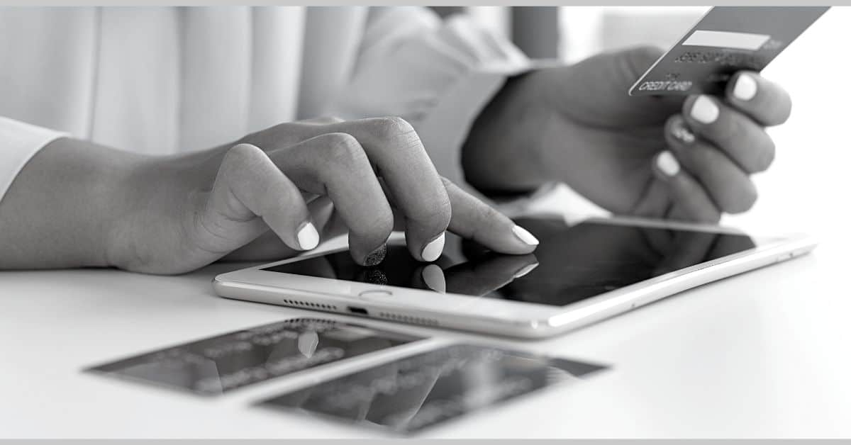 credit card contact vendors category page lady using tablet to make payment