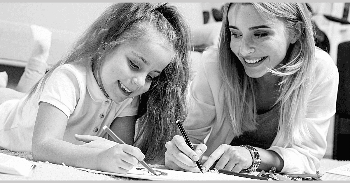 kids and learning category page mom and daughter coloring while laying on the floor